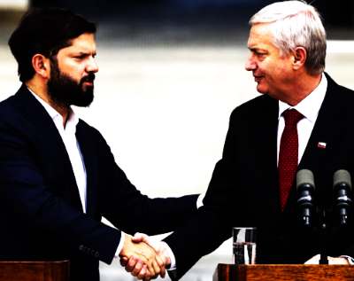 Boric dando la mano a Kast